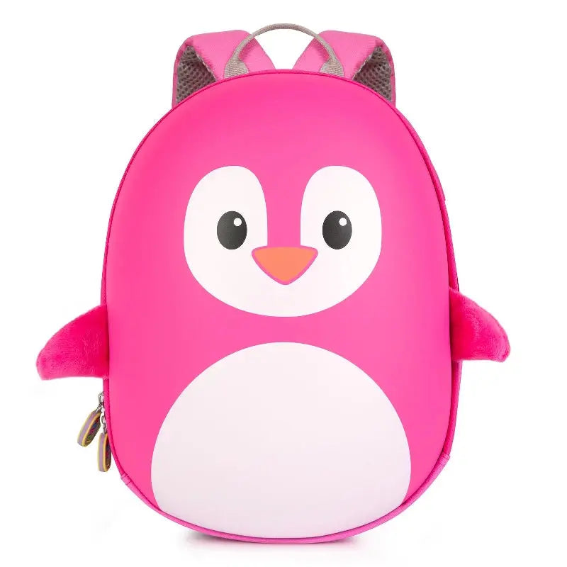 Pink penguin-shaped kids backpack with cute 3D details, perfect for little adventurers.