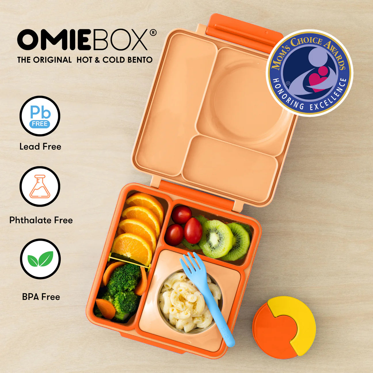 Orange OmieBox kids lunch box with thermos, featuring compartments for healthy food and eco-friendly design.