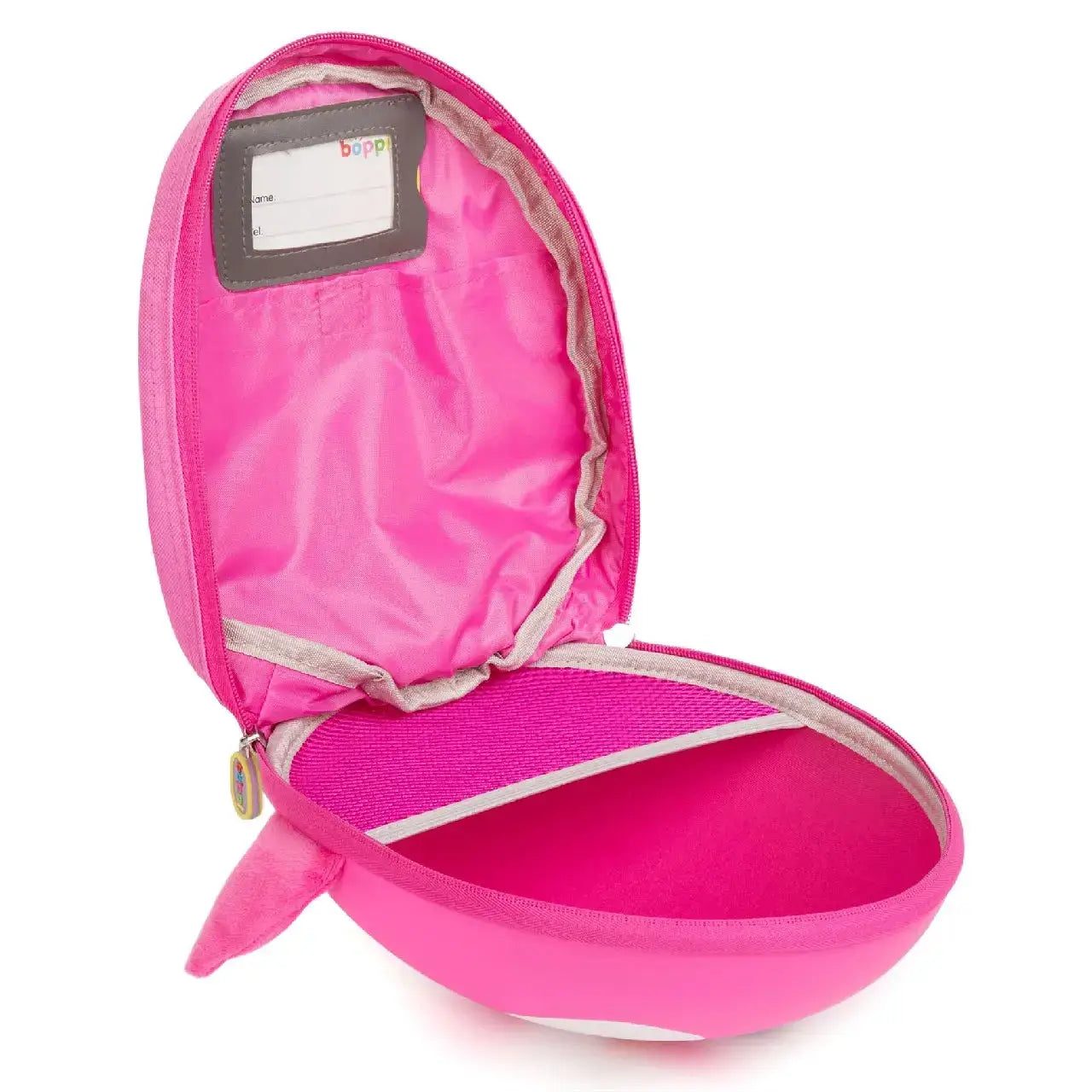 Open pink Boppi Tiny Trekker backpack with interior storage and label holder, perfect for kids' adventures.