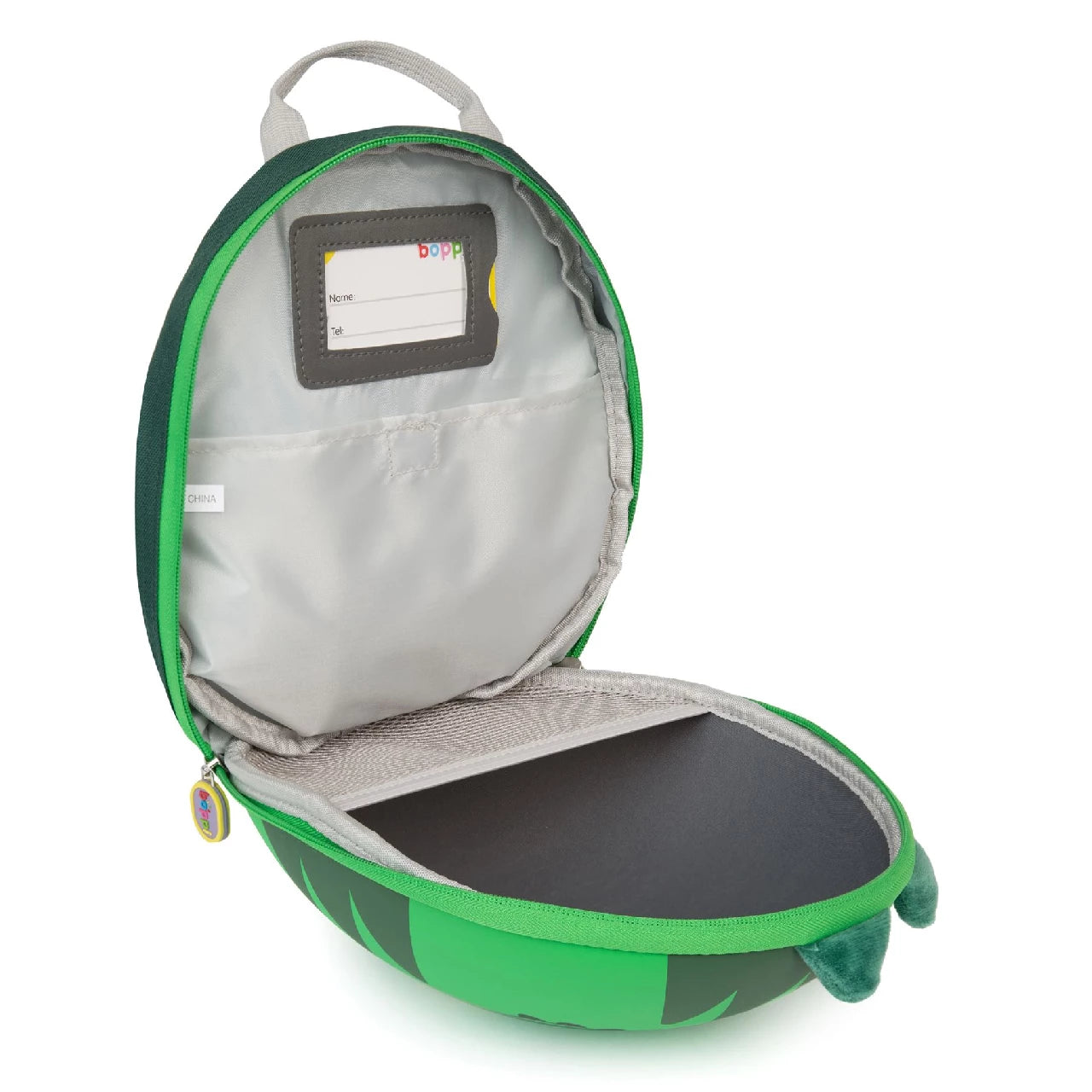 Open green dinosaur backpack by Boppi, featuring a spacious interior and adjustable hand straps for kids.