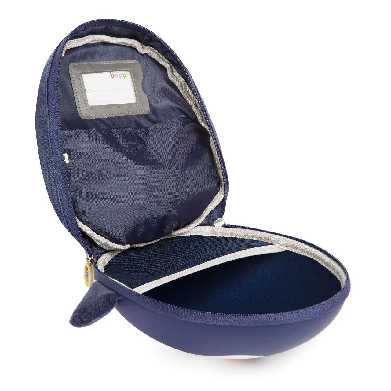 Interior view of a Boppi Tiny Trekker kids backpack, featuring a spacious compartment and navy blue design.